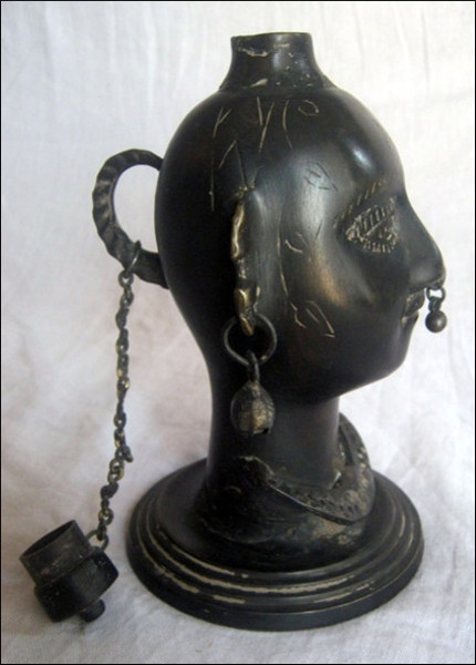 Lady head oil lamp (side view)